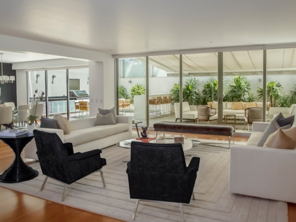 two black suede armchairs during daytime